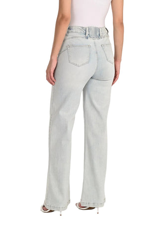 Light blue jeans worn by a person on a white background
