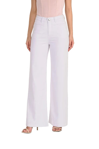 Person wearing light purple pants on a white background