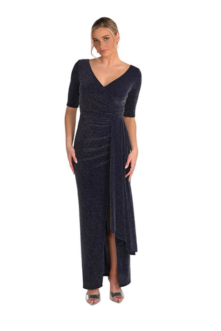 Woman wearing a dark blue evening gown with a V-neckline and quarter sleeves on a white background