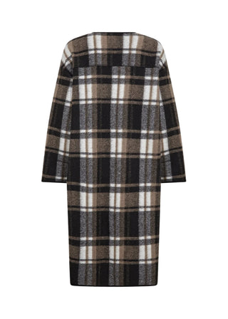 Plaid dress with a pattern of black, white, and brown on a white background