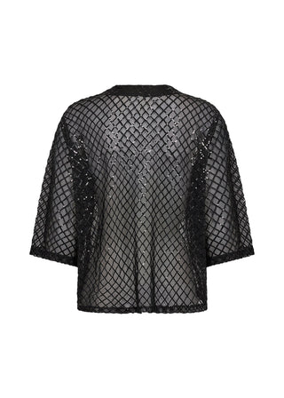 Black fishnet top on a white background