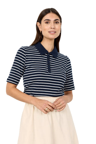 woman wearing navy blue striped shirt with white background