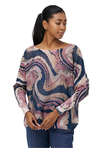 Woman wearing a patterned sweater on a white background