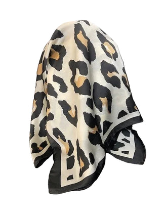 Leopard print towel draped over a chair