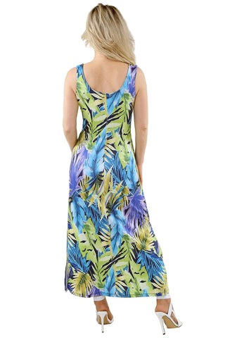 Woman wearing a colorful floral dress on a plain background