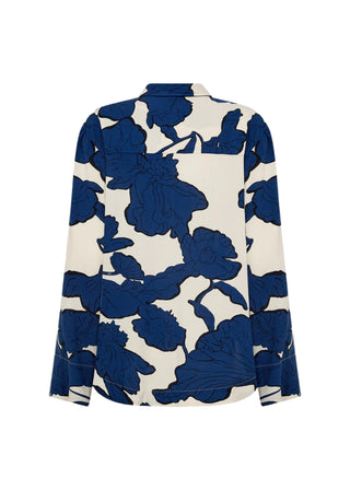 Blue floral patterned blouse on a white background