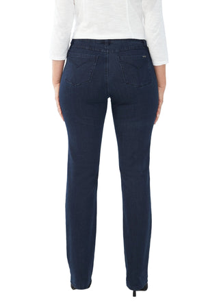 Person wearing dark blue jeans on a white background