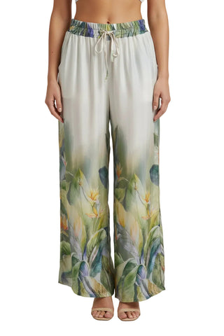 Long floral skirt with a tropical design on a white background