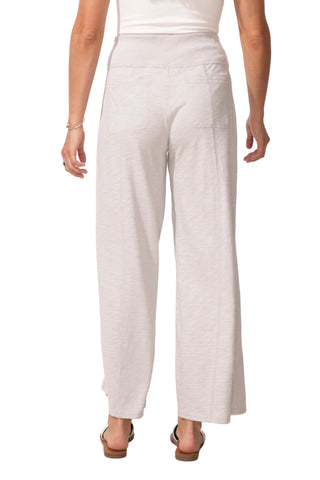 Person wearing light gray wide-leg pants on a white background