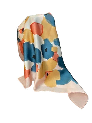 Colorful floral-patterned fabric on a dark chair