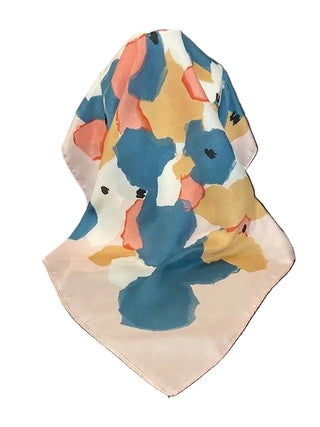 Colorful floral patterned fabric on a black chair