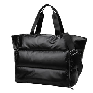 Black puffer tote bag on a white background
