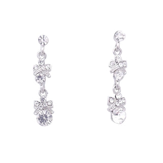Pair of silver earrings with clear gemstones on a white background