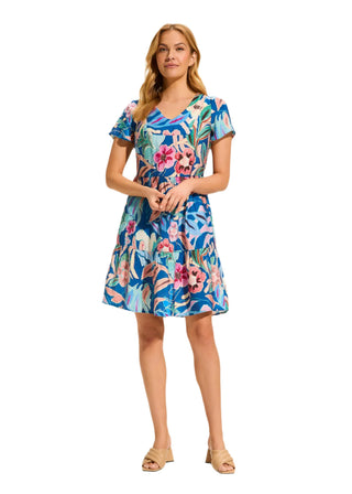 Woman wearing a floral dress on a white background