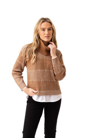 Woman wearing a brown ribbed sweater on a white background