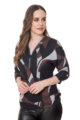 Woman wearing a patterned sweater on a white background