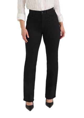A model wearing black high-waisted straight-leg jeans, paired with a white striped shirt and black pointed-toe heels, shown from the waist down on a light gray studio background.