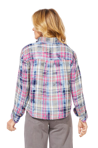 Person wearing a plaid shirt with a white background