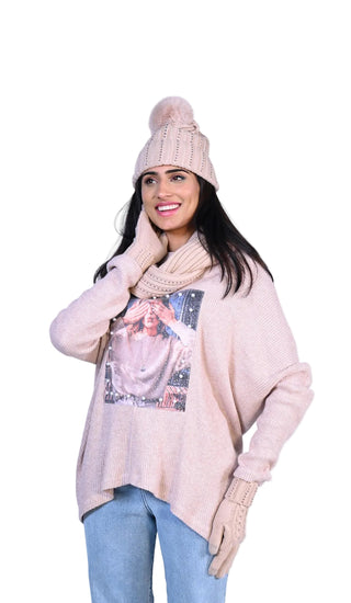 Woman wearing a beige sweater, scarf, and hat with 'Frank Lyman Montreal' branding.
