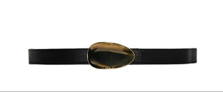 Black belt with a gold buckle on a light gray background