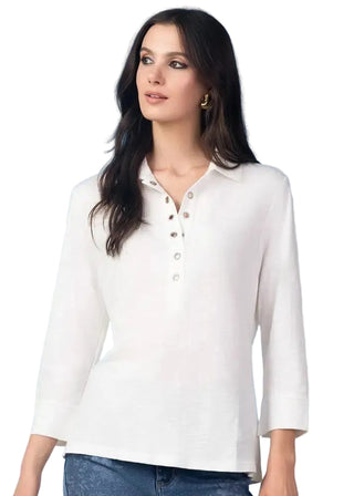 Woman wearing a white blouse with a blue background