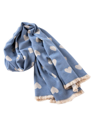 Blue scarf with heart patterns on a white surface