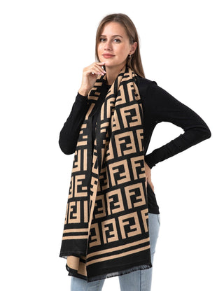 Woman wearing a black and beige patterned scarf on a white background
