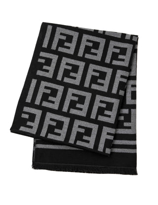 Black and gray patterned scarf on a white background