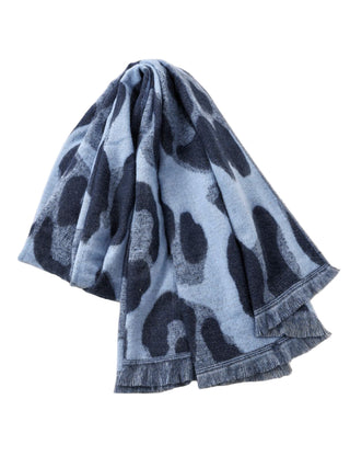 Blue leopard print scarf on a white surface