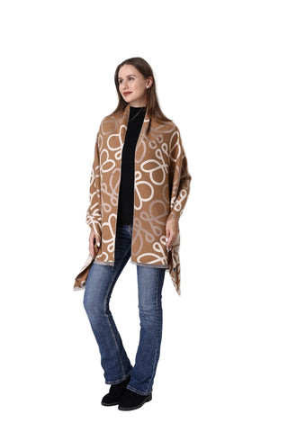 Woman wearing a patterned brown scarf on a white background