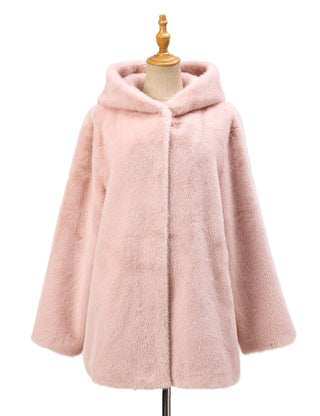 Pink fur coat on a mannequin against a light gray background