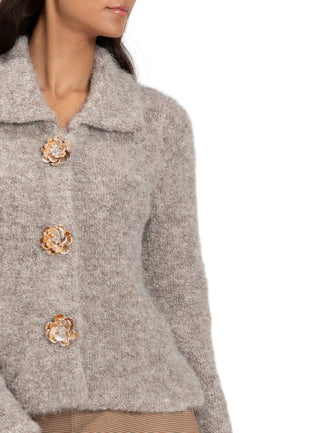 Gray coat with floral button details on a white background