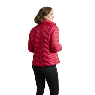 A woman wearing a bright pink quilted puffer jacket, shown from the back and side against a plain light gray studio background.