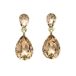 Pair of gold earrings with teardrop-shaped brown gemstones on a light gray background