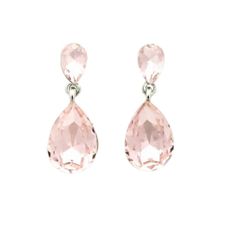 Pair of pink teardrop earrings on a light background