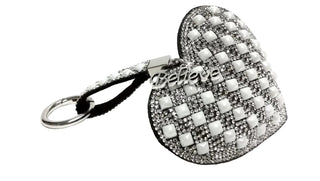 Heart-shaped keychain with 'Believe' text on a white background