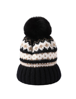 Knitted hat with a black pom-pom on a white background