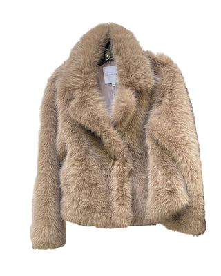 Beige fluffy jacket on a rack with a leopard print jacket in the background.