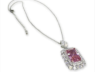 Pink gemstone necklace on a white background