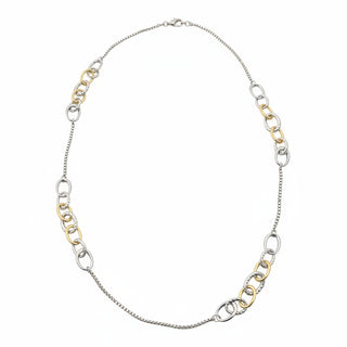 A silver-toned chain necklace with alternating polished and textured oval links, displayed on a white sheet of paper.