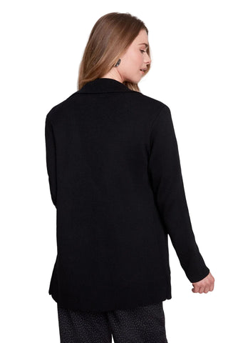 Person wearing a black coat on a white background