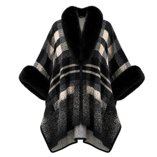A women's open-front poncho-style coat featuring a black, gray, and beige plaid pattern, a thick black faux-fur collar, and matching black faux-fur cuffs, shown against a plain white background.